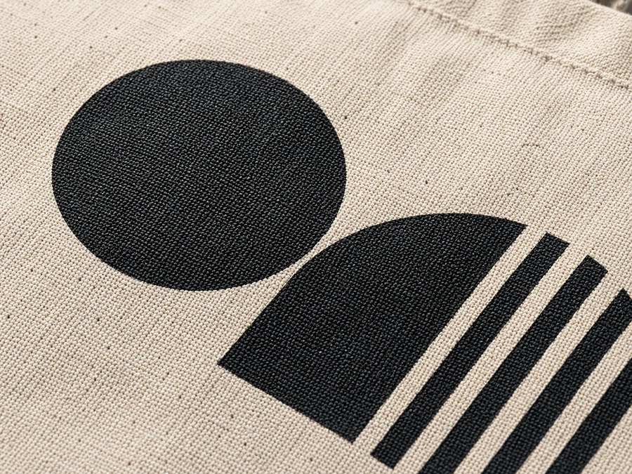 Black silk-screen print on natural cotton canvas